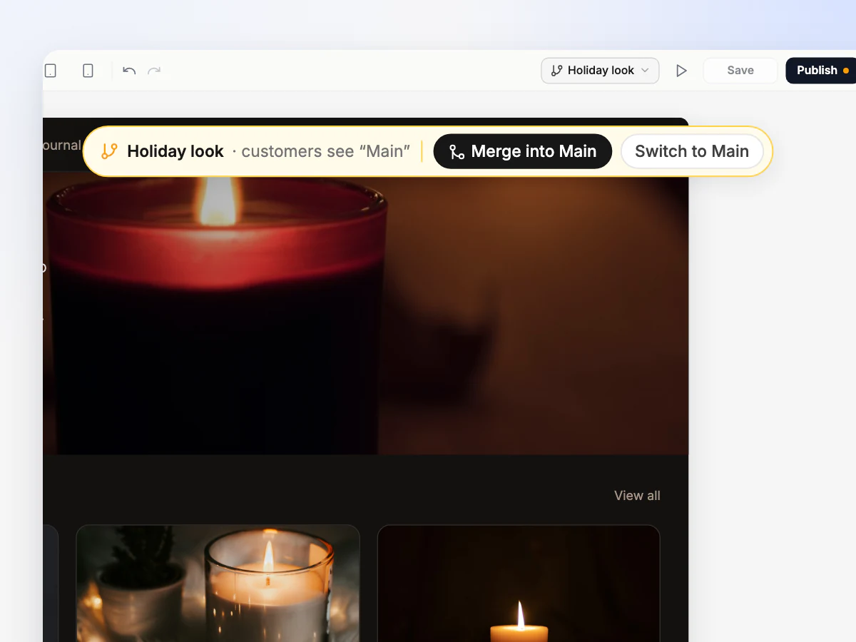 The builder on the Holiday look branch with a darker holiday theme, and a banner saying customers see Main, with Merge into Main and Switch to Main buttons